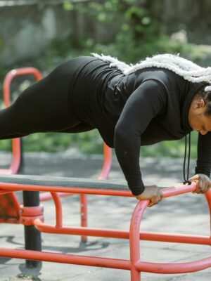 Woman in Black Active Wear doing Push-ups